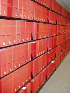 photo of shelving and container boxes housing the McCarthy Memorial Collection